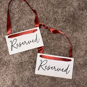 White Reserved Signs with terracotta Ribbon